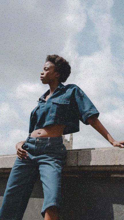 Creator wearing a denim outfit